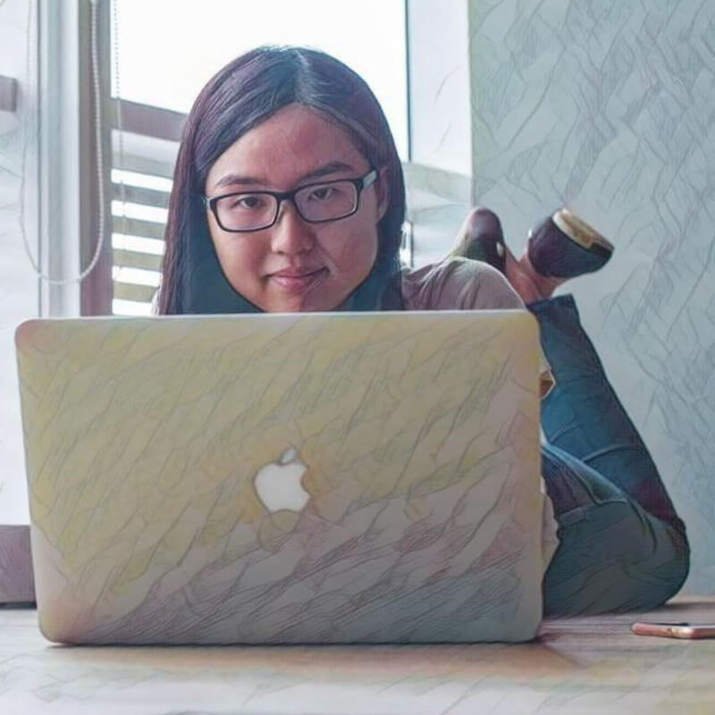 Young programmer on laptop