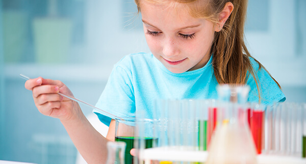 Girl learning chemistry