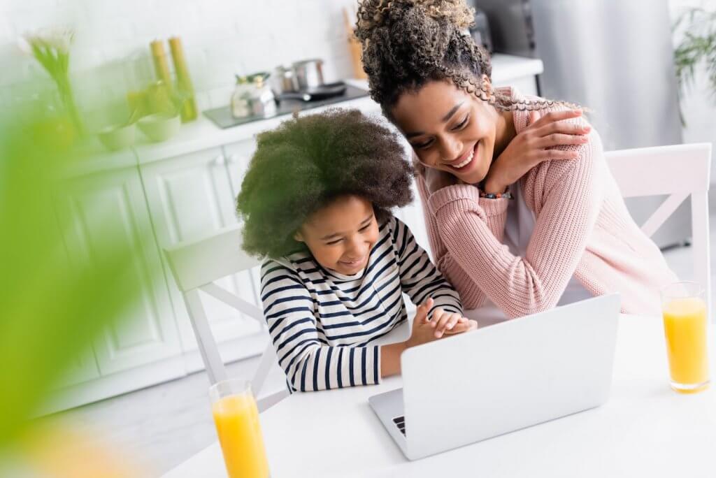 Mom and daughter with laptop