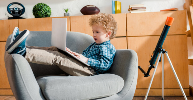 Boy Coding with Telescope