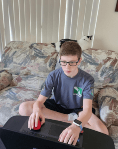 Zach at home coding